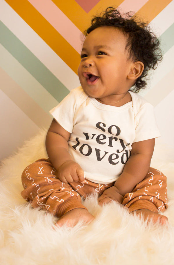 Organic cotton baby bodysuits and onesies at Coco Baby Organics